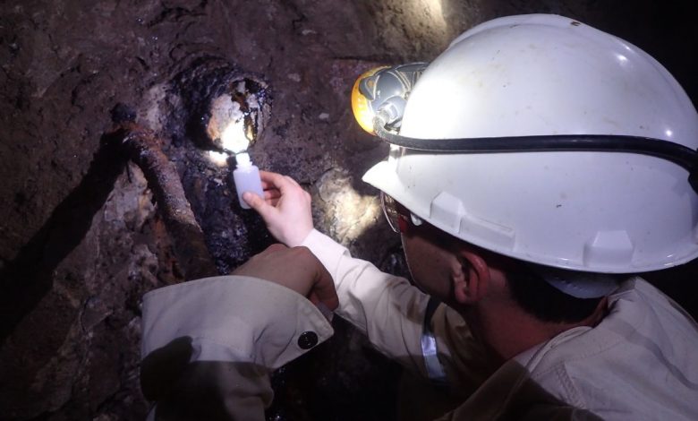 Scientists collect groundwater samples from a mine in South Africa.