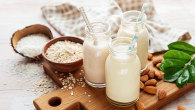 Alternative types of vegan milks in glass bottles