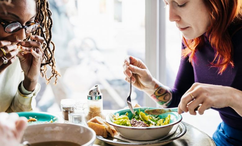 two women enjoying a vegan meal